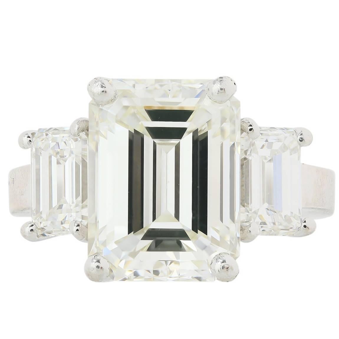 GIA Certified 6.36 Carat Emerald Cut Three Stone Diamond Ring