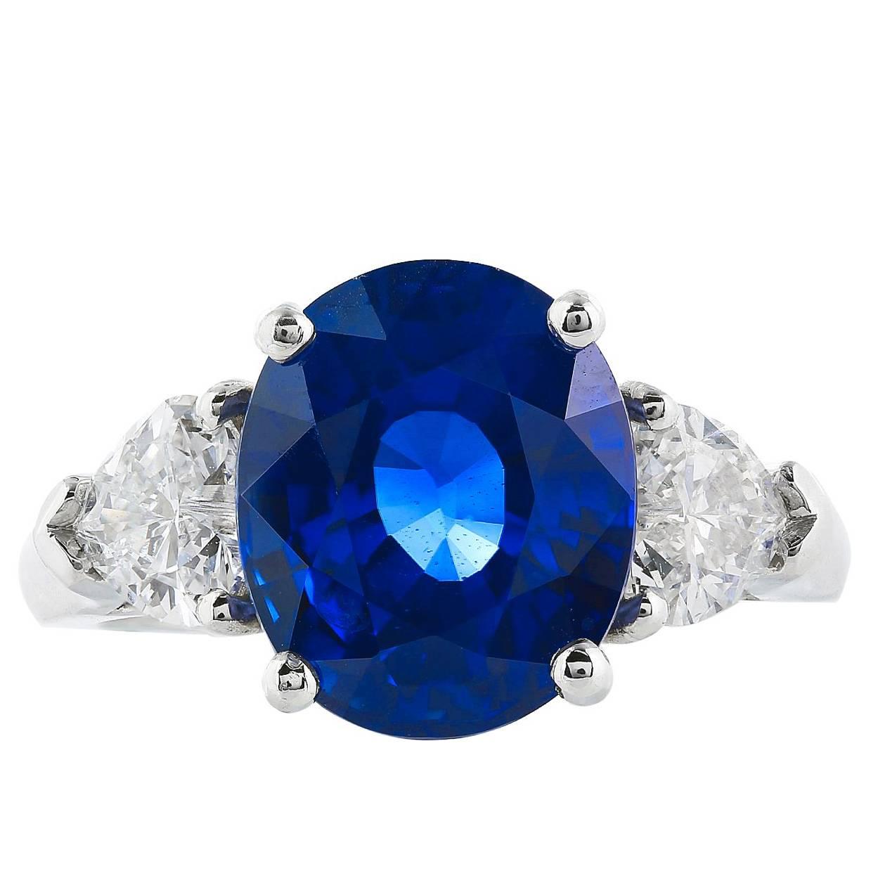 6.52 Carat Ceylon Sapphire and Heart Shaped Diamond Three Stone Ring For Sale