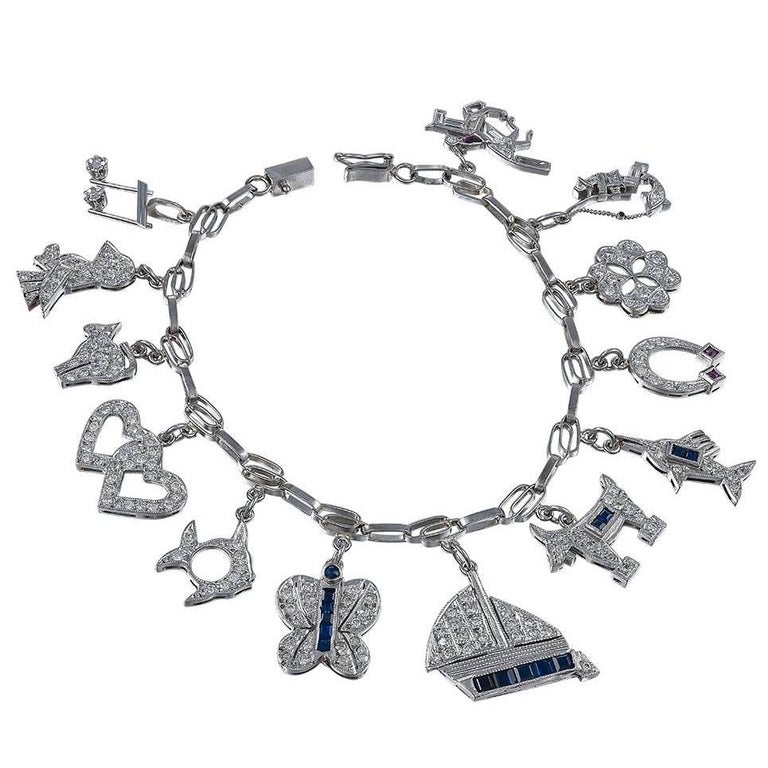 Diamond Platinum Gemset Charm Bracelet For Sale at 1stdibs
