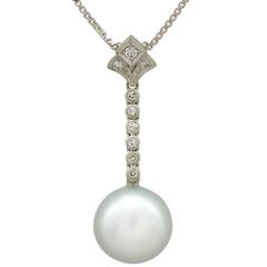 Cultured Pearl and 0.22 Carat Diamond, 14 Karat White Gold Pendant, circa 1980