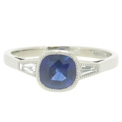Art Deco Style Sapphire Ring with Tapered Baguette Cut Diamond Shoulders