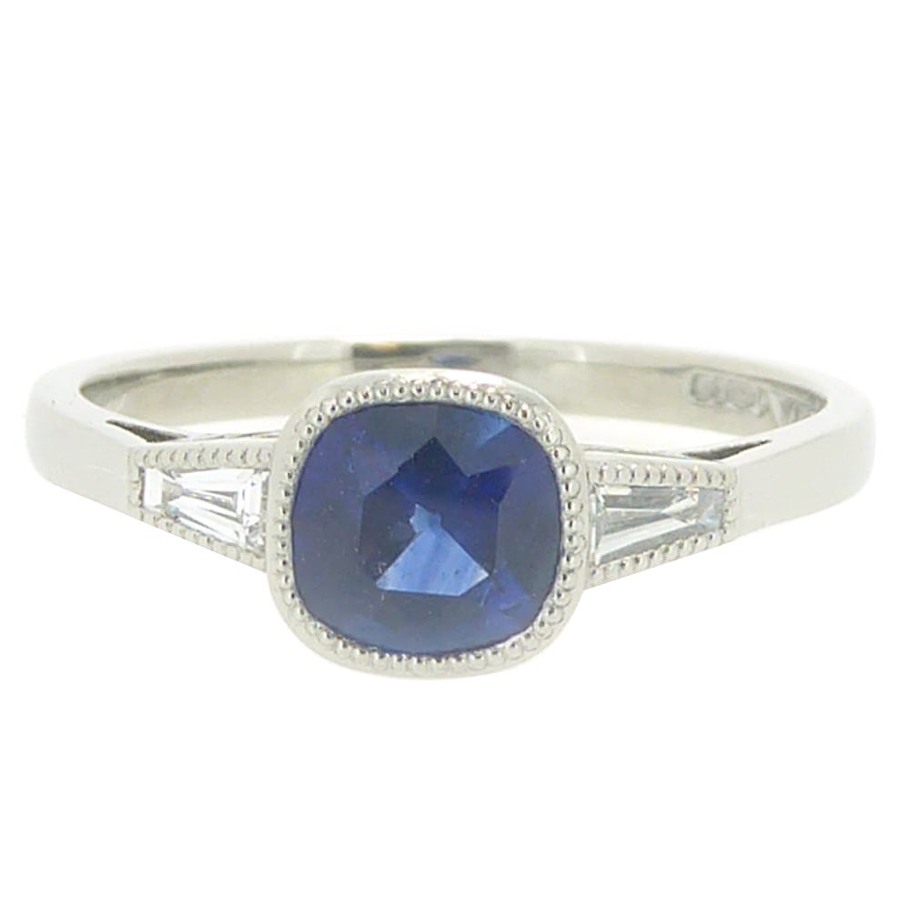 Art Deco Style Sapphire Ring With Tapered Baguette Cut Diamond