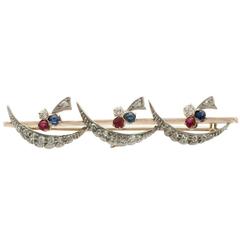 1880s Diamond Ruby and Sapphire Yellow Gold Bar Brooch 4