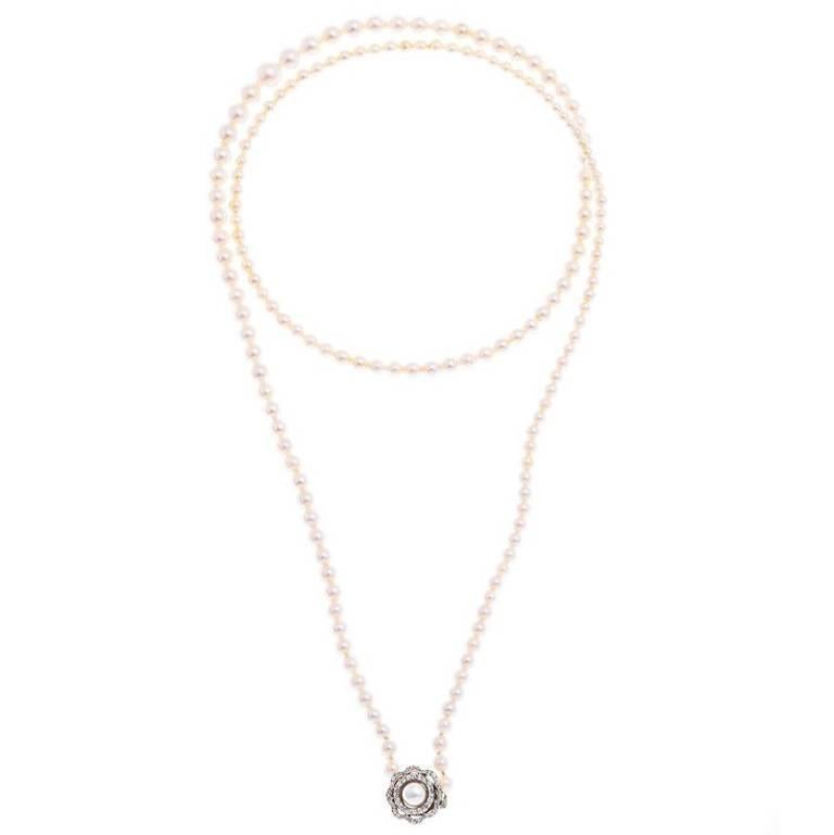 1920s Art Deco Diamond Gold Clasp Pearl Necklace For Sale