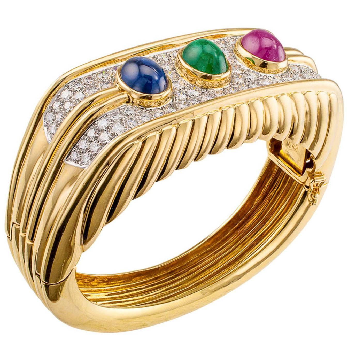 1980s Diamond Emerald Ruby Sapphire Yellow Gold Bangle Bracelet