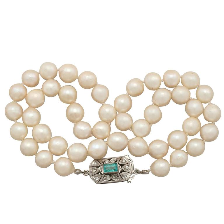 Single Strand Pearl, Emerald, Diamond and White Gold Necklace at