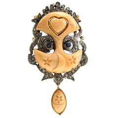 Engraved Face on Orange Coral, Sapphires, Diamonds, Silver and Rose Gold Pendant