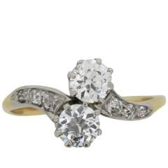 Victorian Twin Old Cut Diamond Crossover Ring with Set Shoulders, circa 1880s