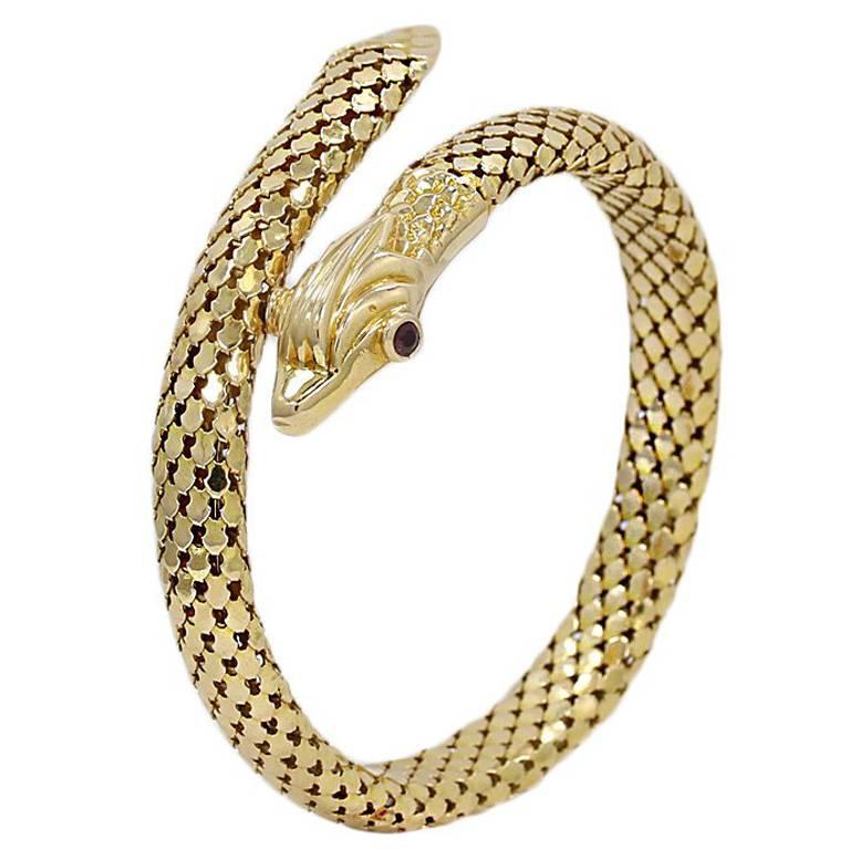 Yellow Gold Serpent Coil Bracelet with Ruby Eyes For Sale