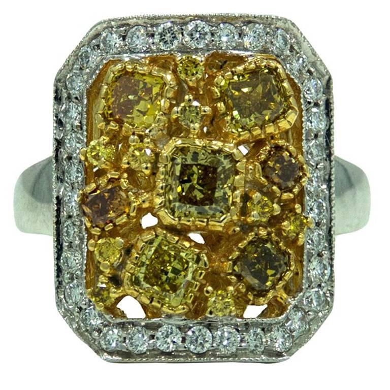 1.49 Carat Yellow Cushion Cut and Round Diamonds White Gold Ring For Sale