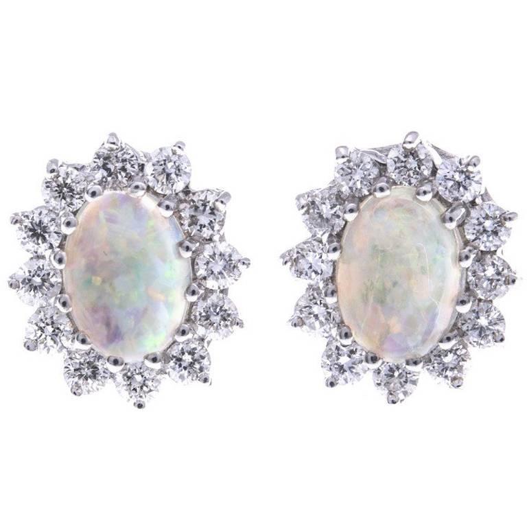 0.88 Carat Opal Diamond Gold Oval Halo Stud Earrings