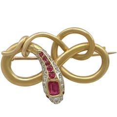 1880s Antique Victorian Ruby and Diamond Yellow Gold 'Snake' Brooch 4