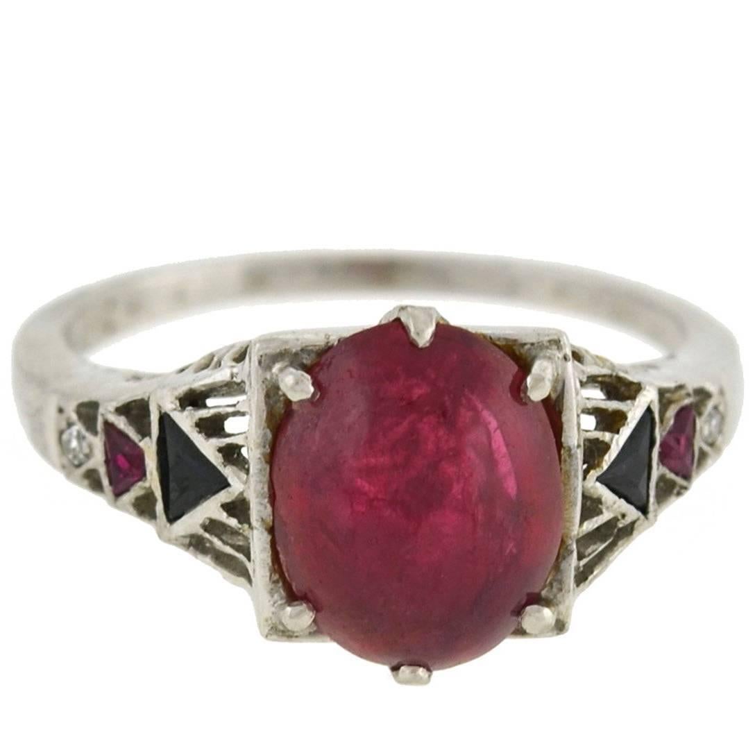 Art Deco GIA Certified 3.50 Carat Natural Ruby Cabochon, Onyx, and Diamond Ring