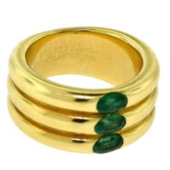 Vintage Cartier Yellow Gold Ellipsed Three Band Fused Three Emerald Ring
