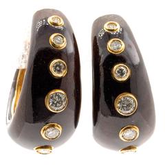 Pair of Diamond, Enamel and Gold Earrings by Christian Dior Pair of Diamond, Enamel and Gold Earrings by Christian Dior