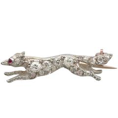 1880s Antique Victorian Diamond and Ruby Gold and Silver Fox Brooch