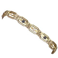 1910s Antique Sapphire and Seed Pearl Yellow Gold Gate Bracelet 1