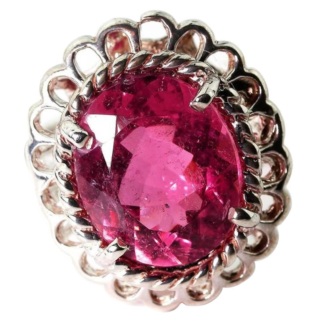 This gorgeous pinky red flawless looking brilliant unique 5.5 Carat Tourmaline doesn't like to have its picture taken !!  There are no eye visible inclusions, chips or nicks on this beautiful sparkling gemstone set in a handmade Sterling Silver