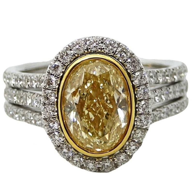 3.01 Carat Yellow Oval Cut Diamond Platinum Engagement Ring For Sale