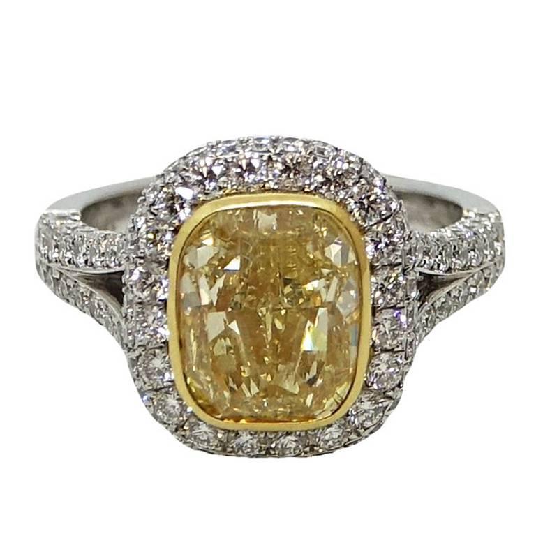 4.00 Carat Fancy Yellow Cushion Cut Diamond Engagement Ring For Sale