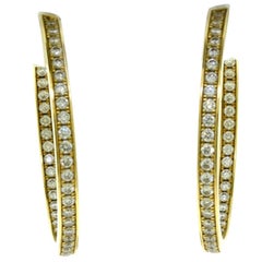 Cartier Inside Out Diamond Hoop Earrings in 18 Karat Yellow Gold