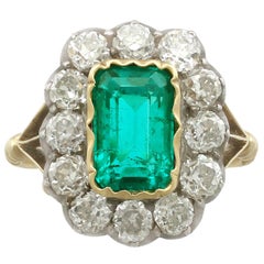 1890s 2 Carat Colombian Emerald and 2.2 Carat Diamond Yellow Gold Cocktail Ring 4