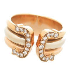 Cartier Double C Tri Color Gold und Diamant Ring