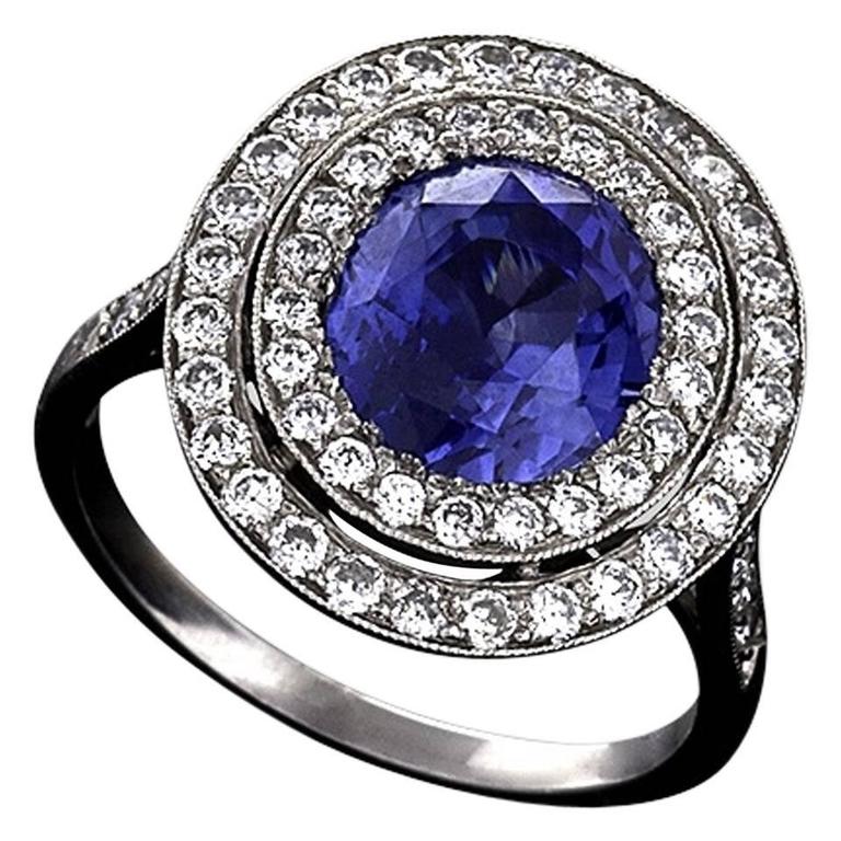 Blue Sapphire Diamond and Platinum Cluster Ring For Sale at 1stdibs