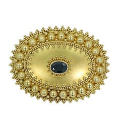 Oval Sapphire Yellow Gold Pin