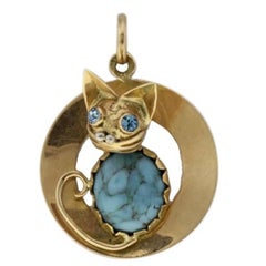 Luise Gold Pendant Embellished with Turquoise Luise Gold Pendant Embellished with Turquoise