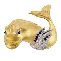 Diamond and Sapphire 18k Gold Renaissance Dolphin Brooch by John Landrum Bryant Diamond and Sapphire 18k Gold Renaissance Dolphin Brooch by John Landrum Bryant