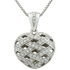 1980s Diamond and 18 Karat White Gold Heart Pendant
