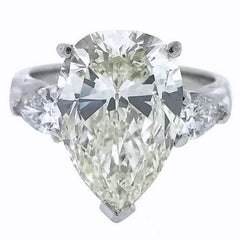 Vintage GIA 6.22 Carat Centre Pear Brilliant Diamond Engagement Ring in Platinum