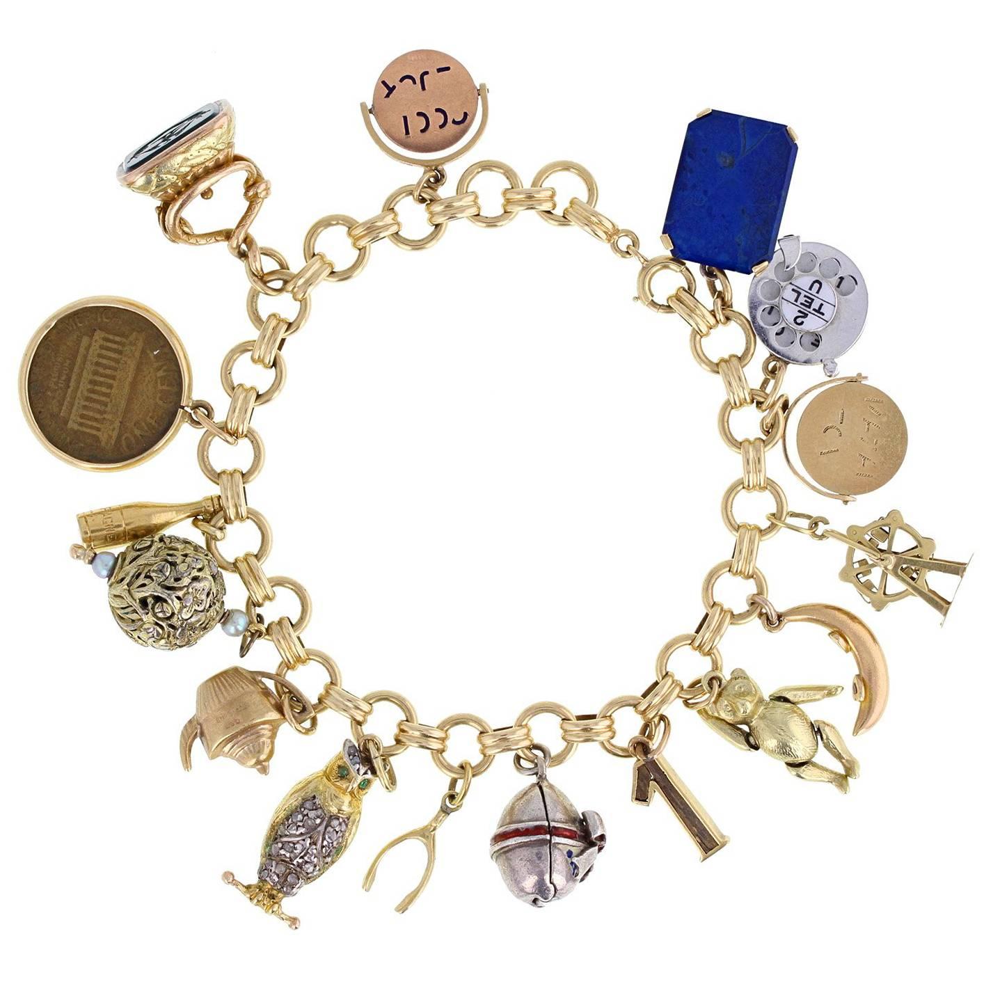 Vintage Gold Charm Bracelet with 16 Various Charms