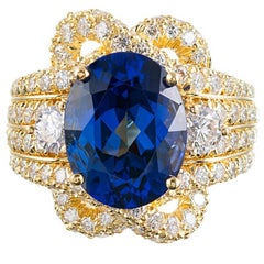 Henry Dunay 6.41 Carat Oval Tanzanite Diamond Ring