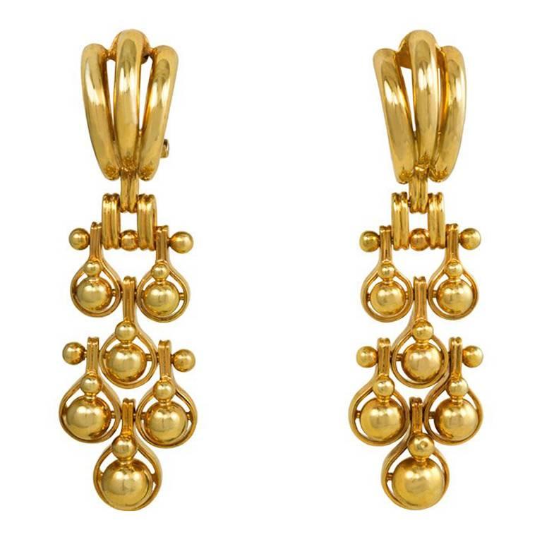 1940s Gold Earrings with Articulated Ball Pendants