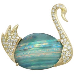Vintage 1980s 13.79 Carat Opal 1.15 Carat Diamond 18 Karat Yellow Gold 'Swan' Brooch
