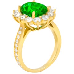 GIA Certified 4.20 Carat Green Emerald in Halo by 1.80 Carat of Diamonds Ring