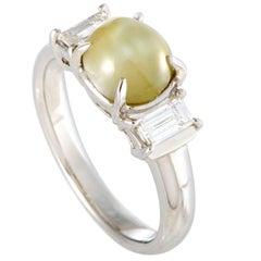 Vintage Diamond and Cat
s Eye Cabochon Platinum Ring