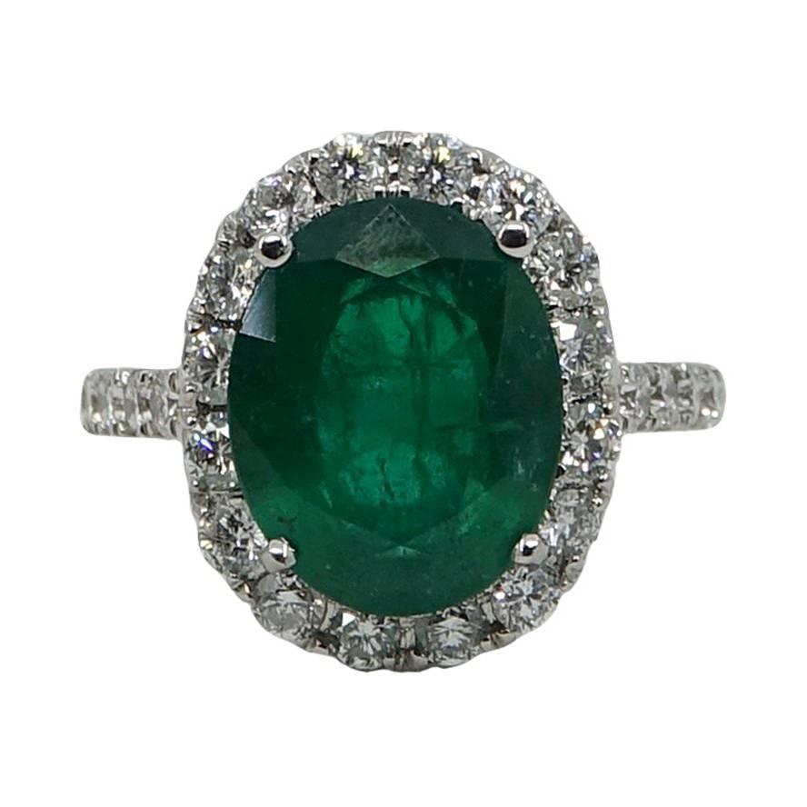 5.20 Carat Oval Cut Emerald and Diamond White Gold Engagement Ring For Sale