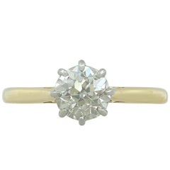 Antique 1920s 1.25 Carat Diamond and Yellow Gold Platinum Set Solitaire Ring