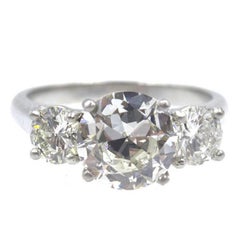 Three-Stone Round Brilliant Cut Diamond Platinum Engagement Ring