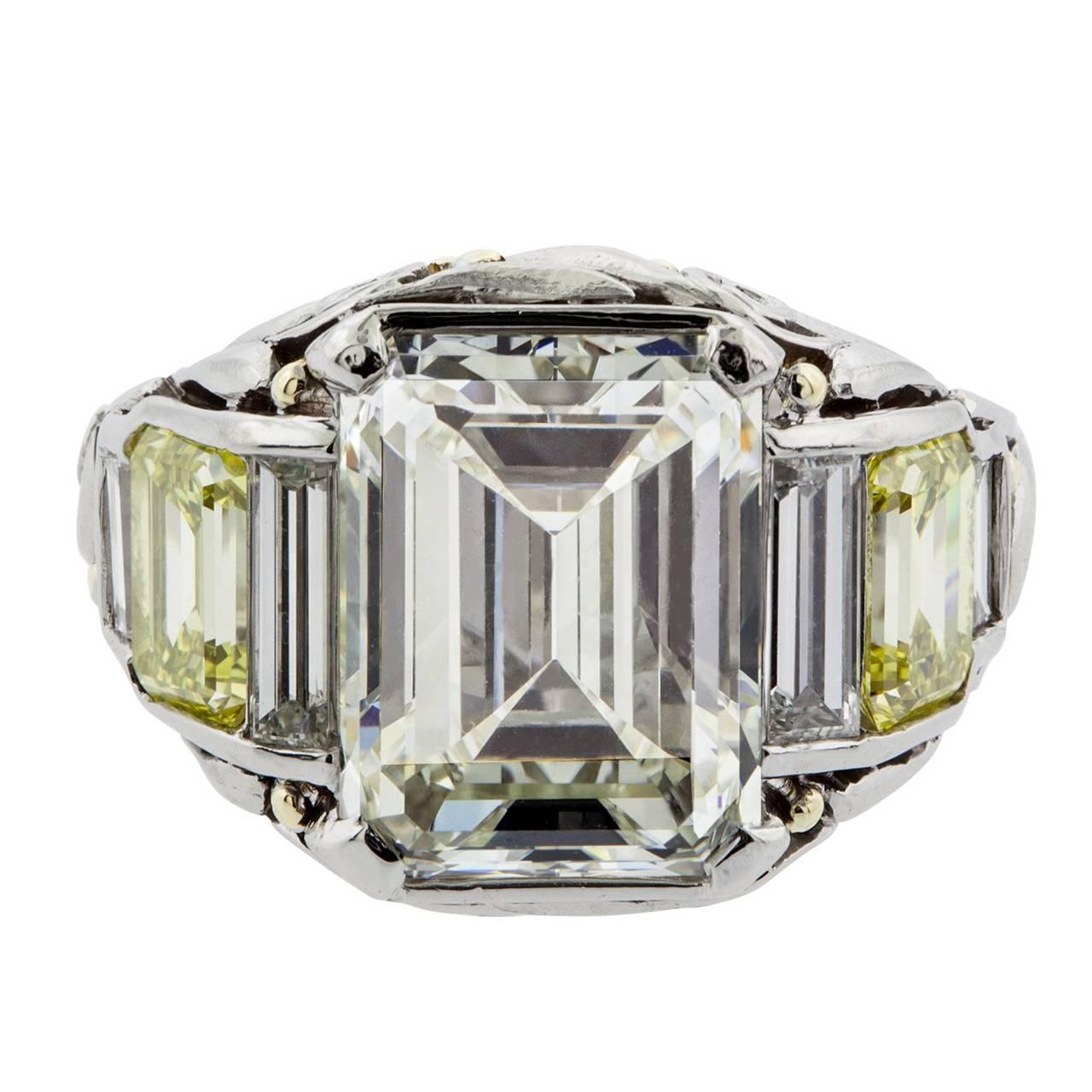 5.01 Carat Emerald Cut Diamond and Fancy Yellow Diamond Platinum and Gold Ring