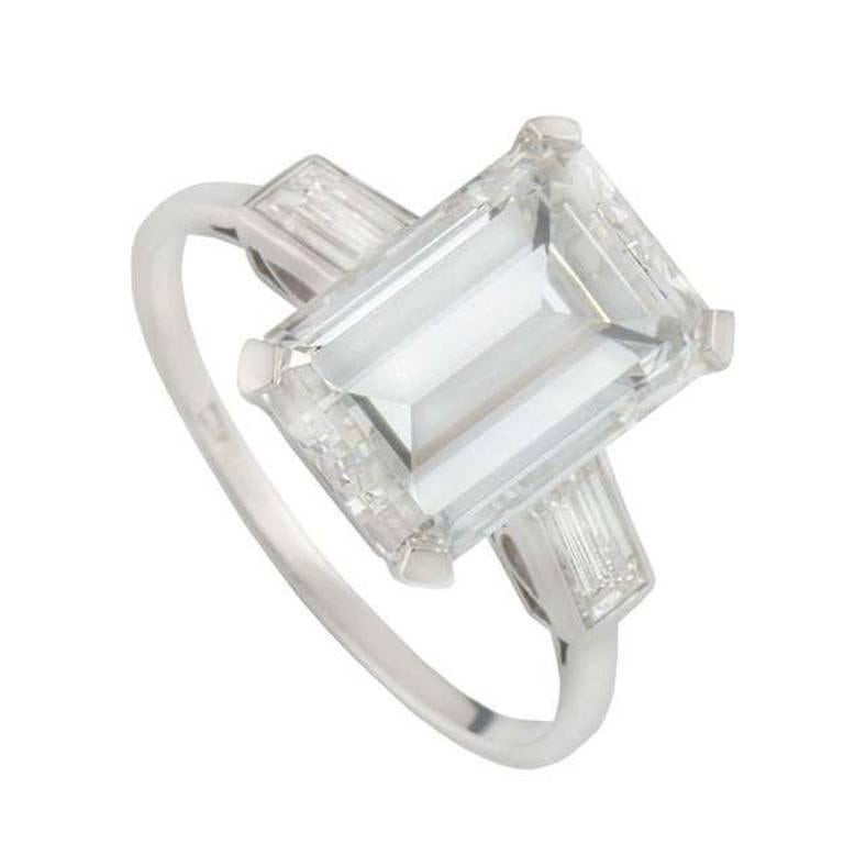 GIA Certified Emerald Cut Three Stone Diamond Engagement Ring 7.02 Ct H/VS1