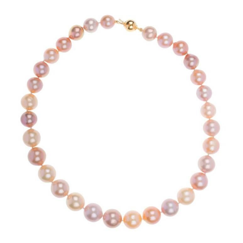 Natural Pink Edison Pearl Strand with 9 Carat Gold Clasp For Sale