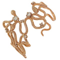 Bracelet manchette serpent en or rose et diamants fabriqué à la main en Italie 