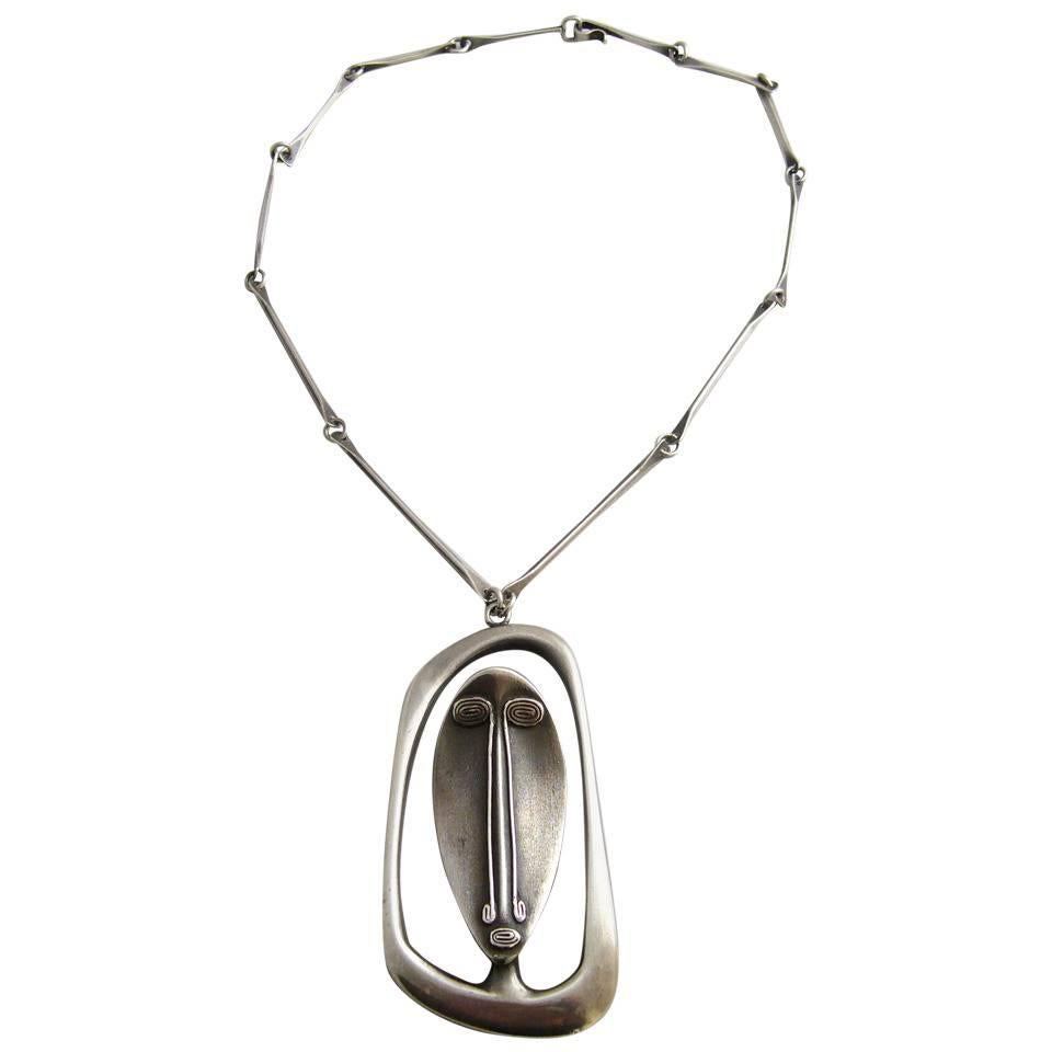 Irvin and Bonnie Burkee Sterling Silver Mask Necklace