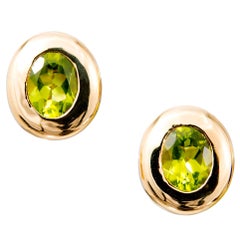 4.10 Carat Oval Green Peridot Domed Gold Bezel Stud Earrings