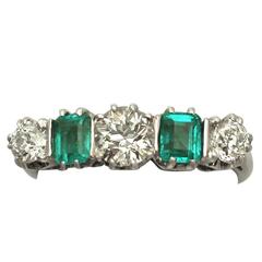 1.18 Carat Diamond and 0.72 Carat Emerald, 18k White Gold Five Stone Ring