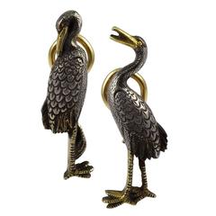 A dissimilar Pair of Antique Japanese Crane Earrings